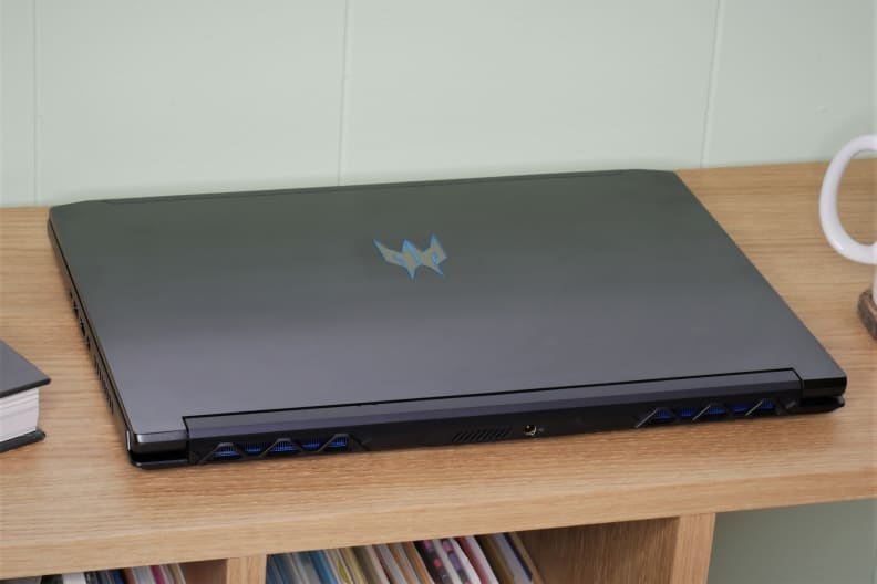 A photo of the Acer Predator Triton 300 gaming laptop closed on a bench