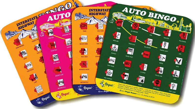 An image of four differently colored travel bingo cards.