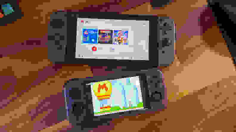 A smaller purple gaming handheld compared to the nintendo switch