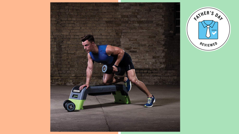 A man works out on his Escape fitness bench. He is using handweights.