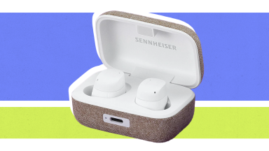 An image of a pair of white Sennheisers Momentum True Wireless 3 earbuds in their gray case.