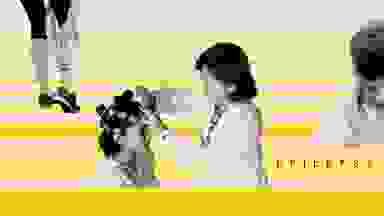 An epilepsy illustration showing a female physician sticking wires to a female patient's head. There is also a child squinting their eyes and holding their head and a person grabbing the back of their leg.