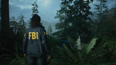 A woman in an FBI jacket going into a dark forest