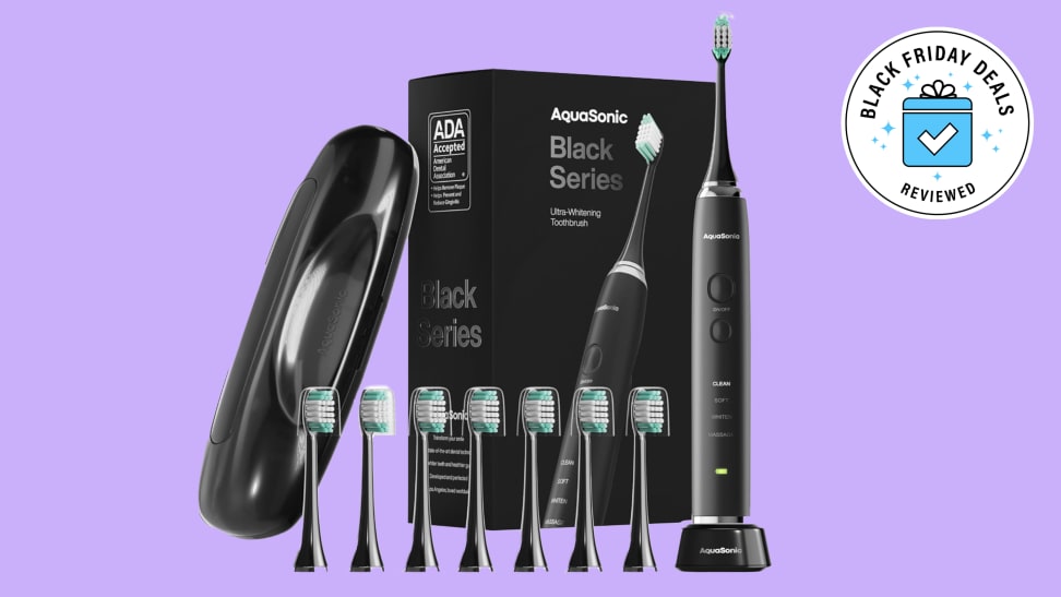 An image of the Aquasonic electric toothbrush on a purple background.