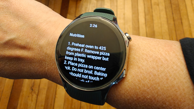 Google Assistant provides a recipe on the display of a OnePlus Watch 2 on a wrist.