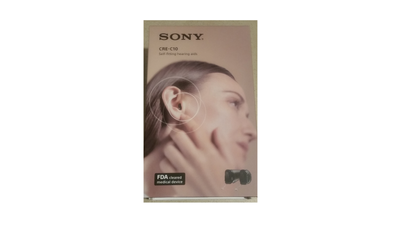 hearing aid box showing person wearing it