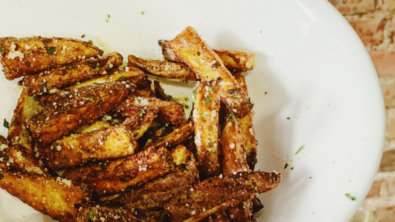 Toss in more grated Parmesan, parsley, and oregano to add flavor.