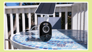 The Reolink Argus 3 Pro with Solar Panel on an outdoor table