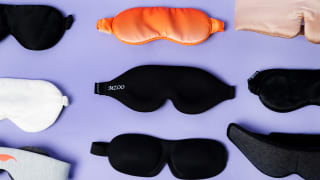 A collection of sleep masks against a purple background