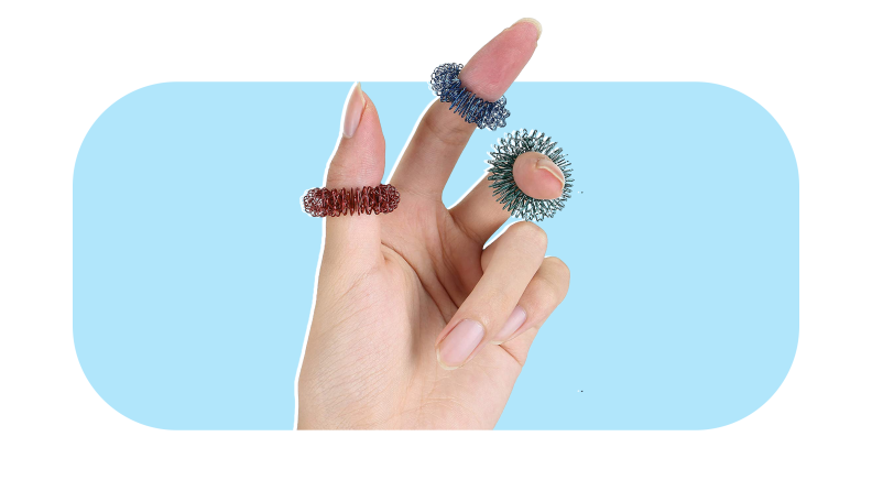 Hand displaying three Mr. Pen Spikey Sensory Rings on fingers.