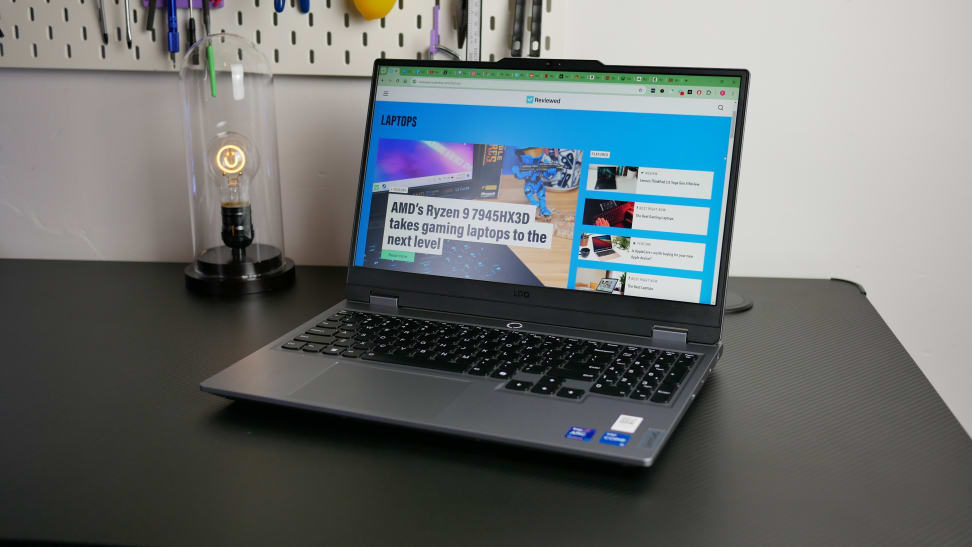 The Lenovo LOQ with the Reviewed homepage displayed on it.