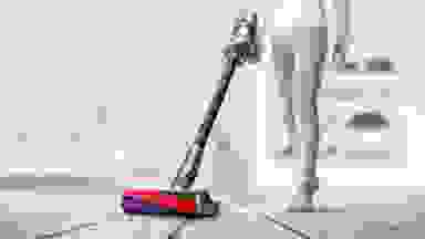 Woman vacuuming crumbs