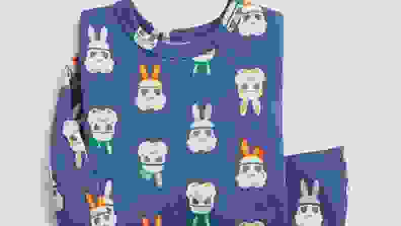 A blue set of PJs where there are prints of stormtroopers wearing bunny ears