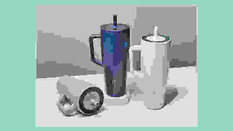insulated cups on blue background
