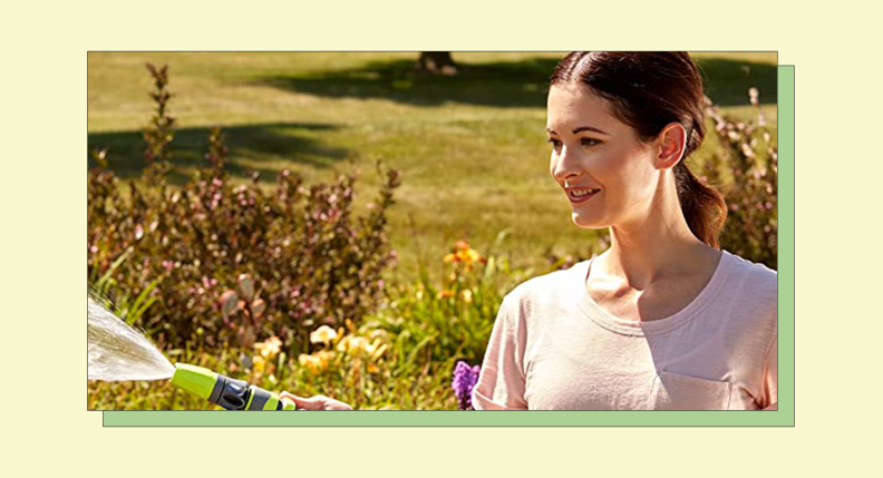 A person watering the garden