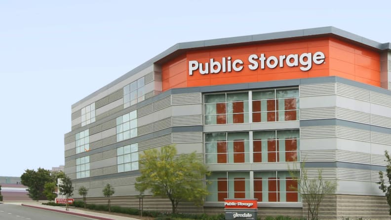 A large, orange-and-white storage facility