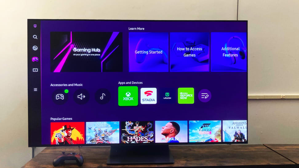 A 55-inch Samsung S95B OLED TV displaying the home screen of Samsung's Gaming Hub platform
