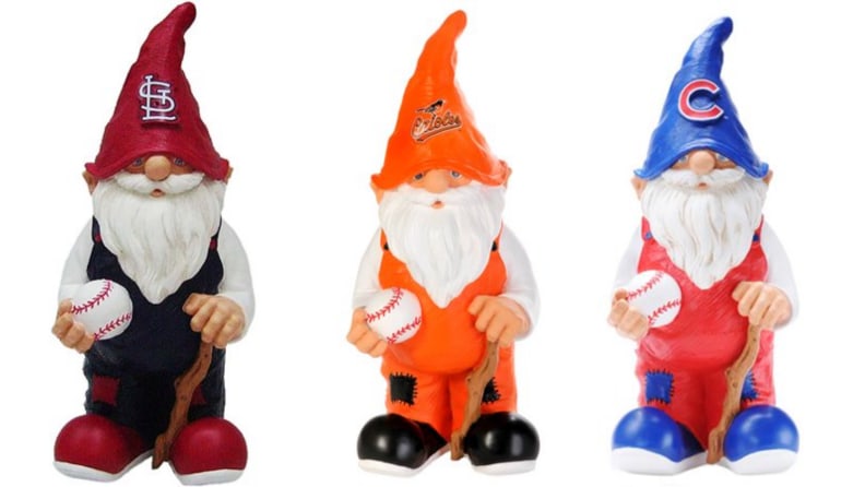 Three gnomes holding baseballs and canes
