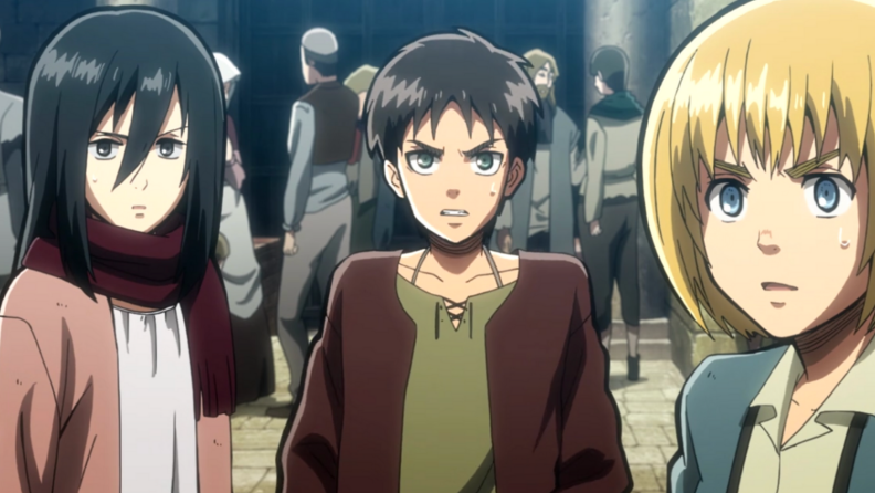 A still from Attack on Titan that features Mikasa, Eren, and Armin