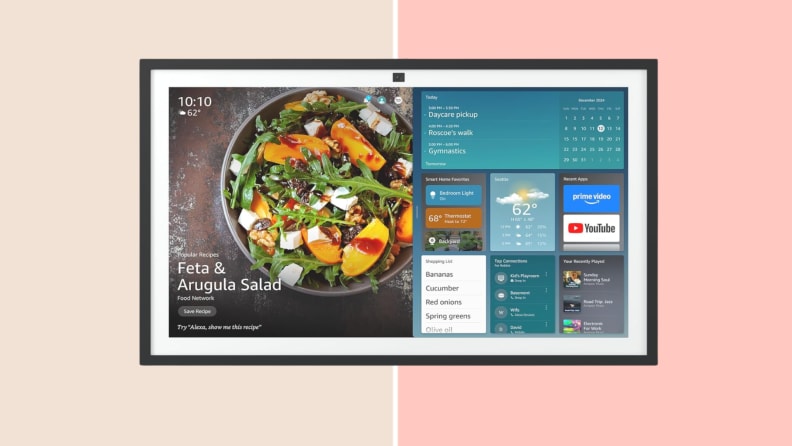 A large TV screen sits on a pink and beige colorblock background