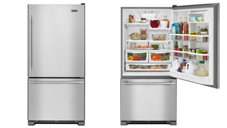 A Maytag refrigerator with a bottom freezer