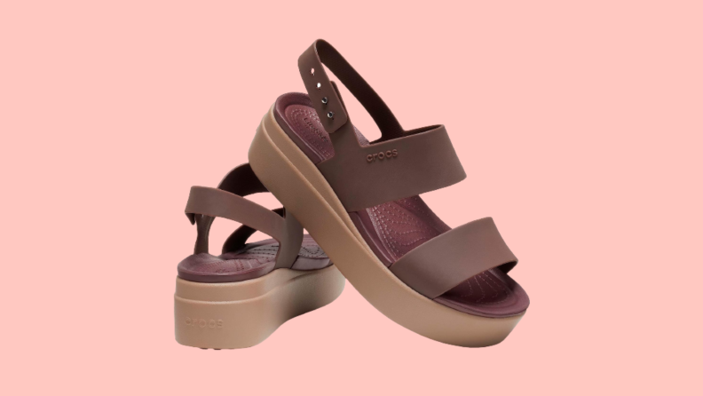 Rubber platform sandals with brown straps.