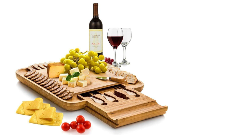 Cheeseboard with snacks and wine