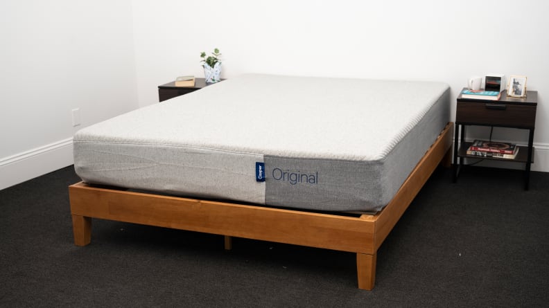the Casper Original Mattress sits on a brown bed frame