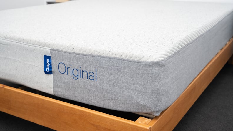 the casper original on a brown bed frame