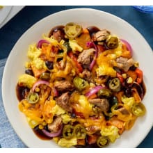 Product image of Smoked port and scrambled egg bowl with sweet potatoes, black beans, and corn