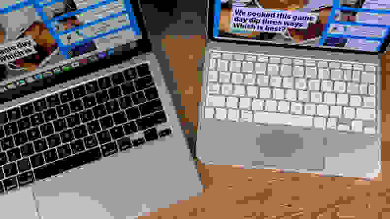 A MacBook Air and an iPad Pro sit on a desk and show off their keyboards