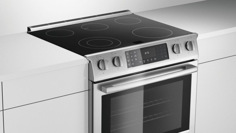 A Bosch electric range shot from an angle, surrounded by white countertops.