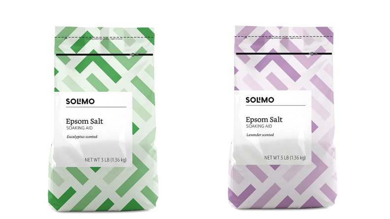On left, green bag of Solimo epsom salt. On right, purple a bag of epsom Solimo epsom salt.