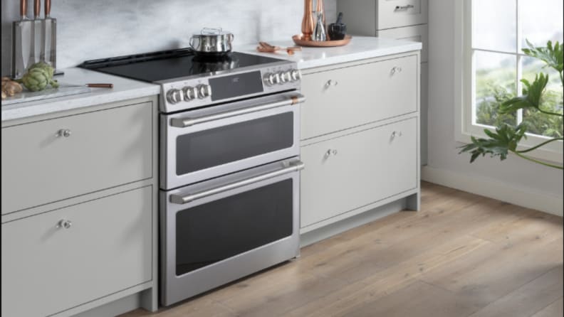 A range sits in cabinetry in a kitchen setting
