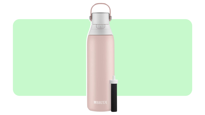 A Brita water bottle in the color pink on a green and white background.