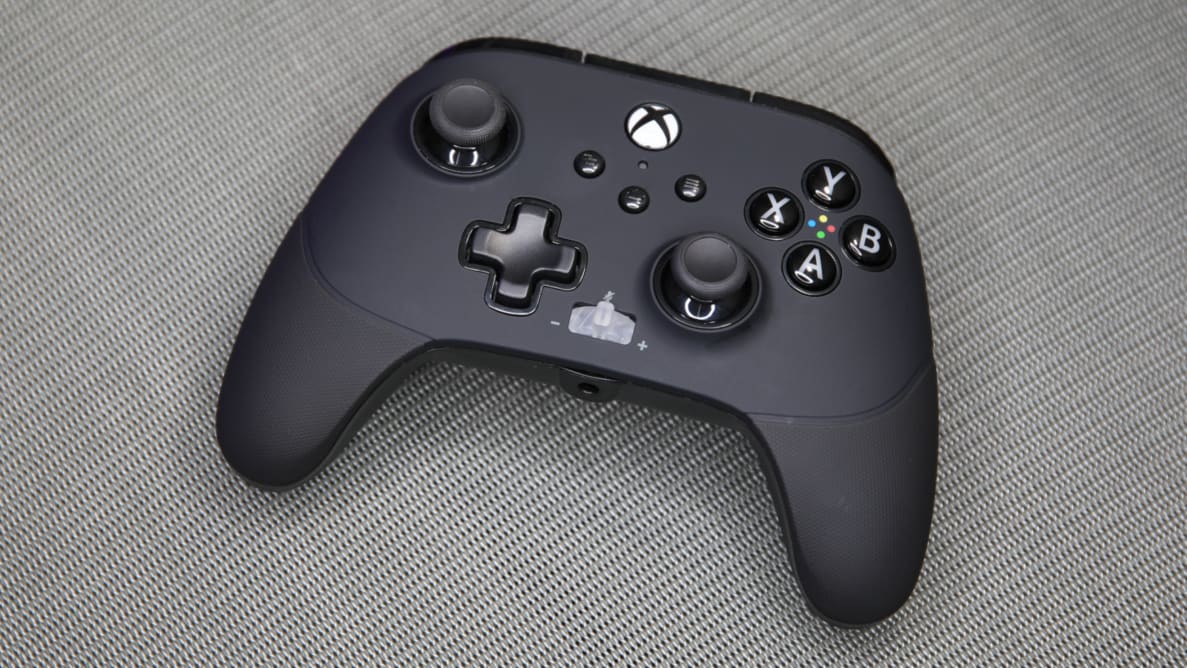 Overhead image of the PowerA Fusion Pro 3 Wired Controller on a gray surface.