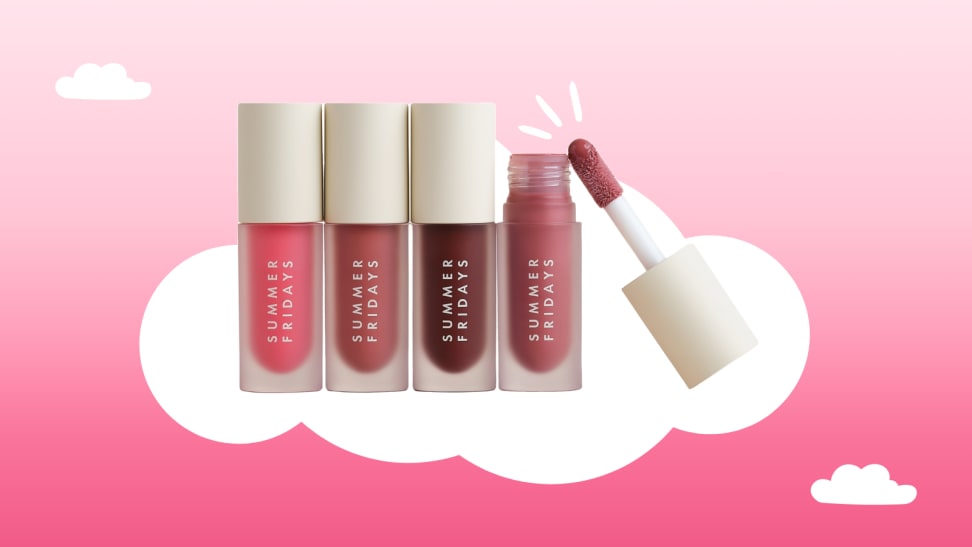 Four Summer Fridays lip oils against a pink background sitting on a cloud.