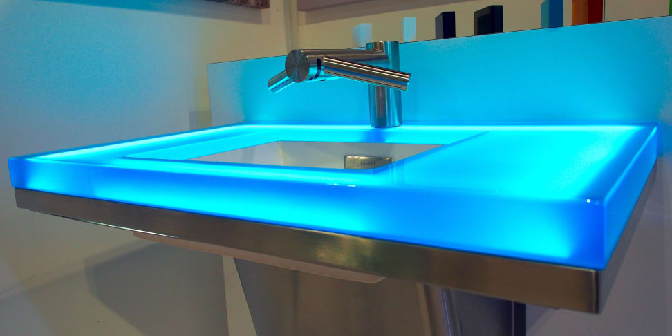 Neo-Metro translucen resin glowing sink with Dyson Airblade Tap