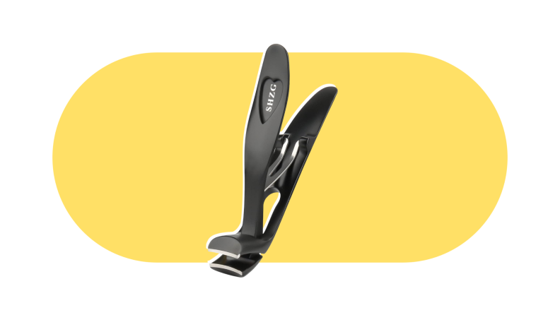 The SHZG nail clippers on a yellow and white background