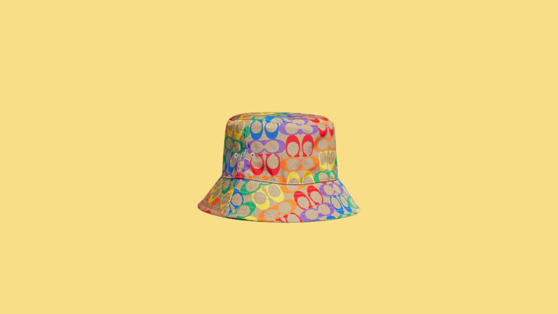 rainbow printed bucket hat on yellow background