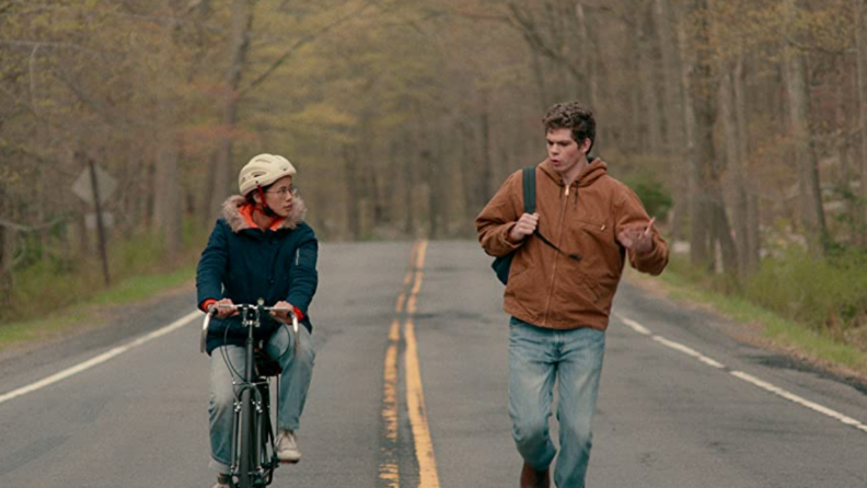 An image of Ellie and her friend Paul on a road as they discuss their mutual love interest.