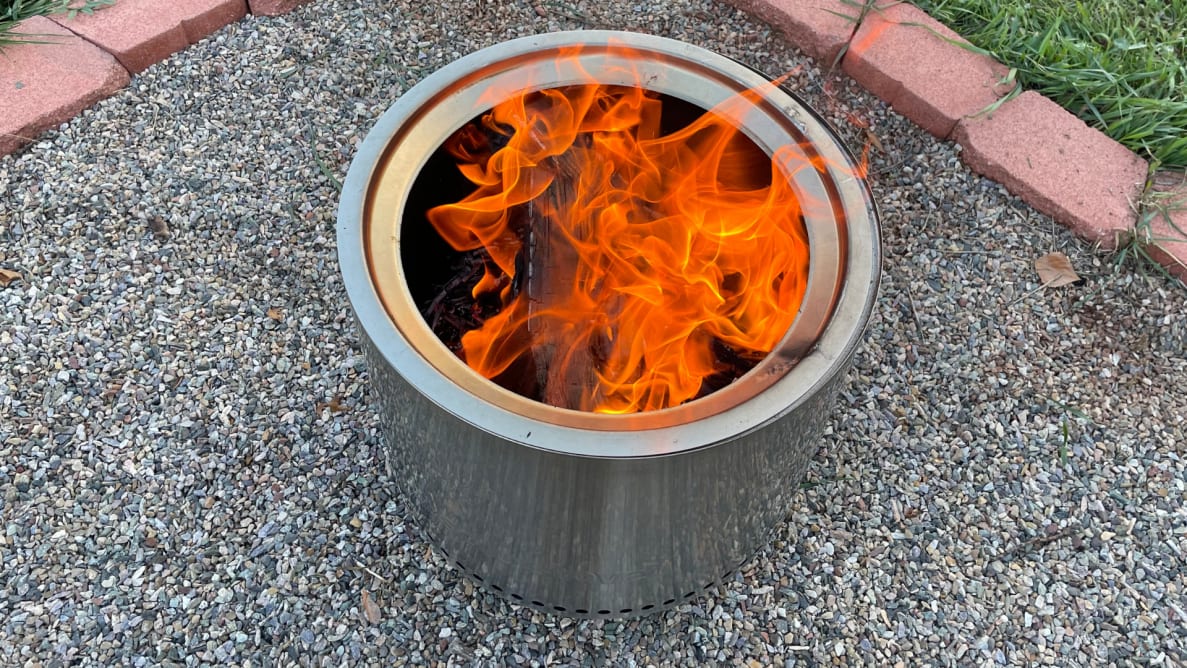 Close up of a lit Solo Stove Bonfire outside.