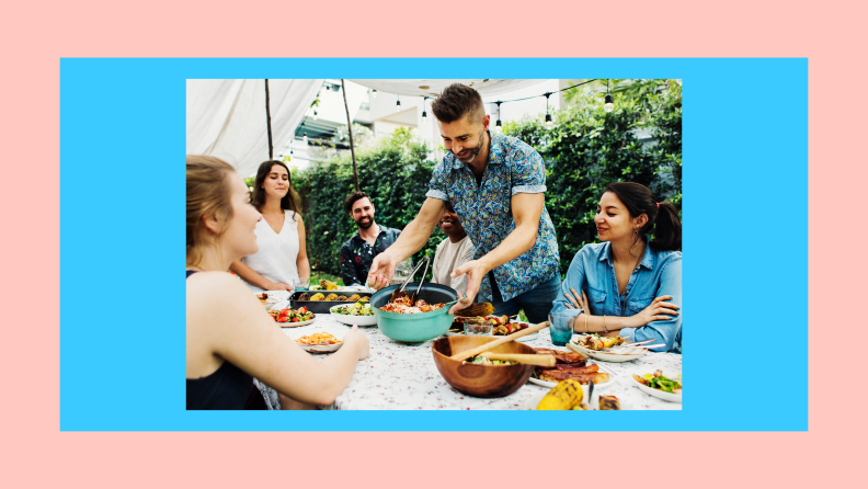 Friends enjoying a barbecue together outdoors.