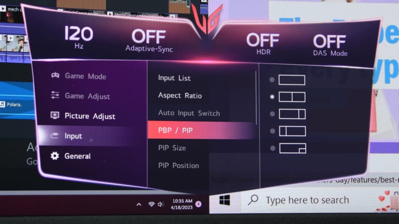 Close-up image of an ultrawide monitor screen with picture-by-picture (PIP)/picture-in-picture (PIP) modes selected on a menu.