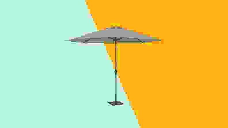 Standing gray patio umbrella.