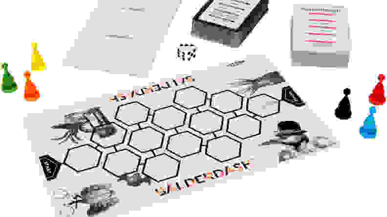 Balderdash board game on white table
