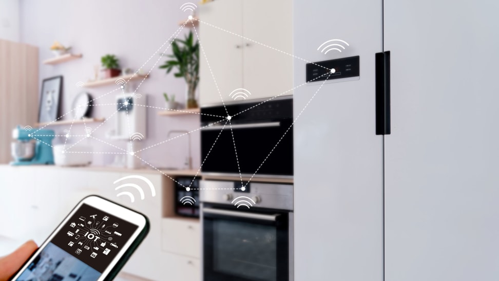 Do your appliances really need WiFi and Bluetooth? In the image, we see a smartphone with some drawn-in WiFi signal symbols and dotted lines showing it's connected to various appliances around the room.