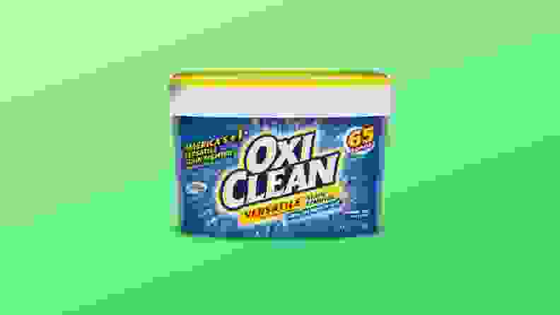 A three-pound tub of OxiClean, a stain remover that uses oxygen bleach, appears on a gradient green background