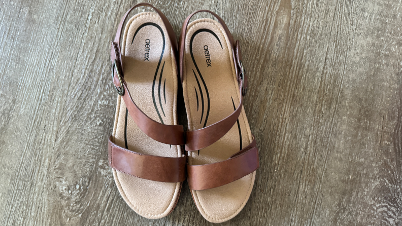 A pair of Tamara Aetrex sandals