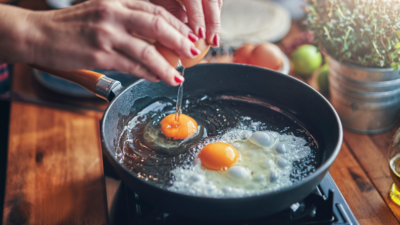 You can cook eggs on cast iron if you properly season the skillet.